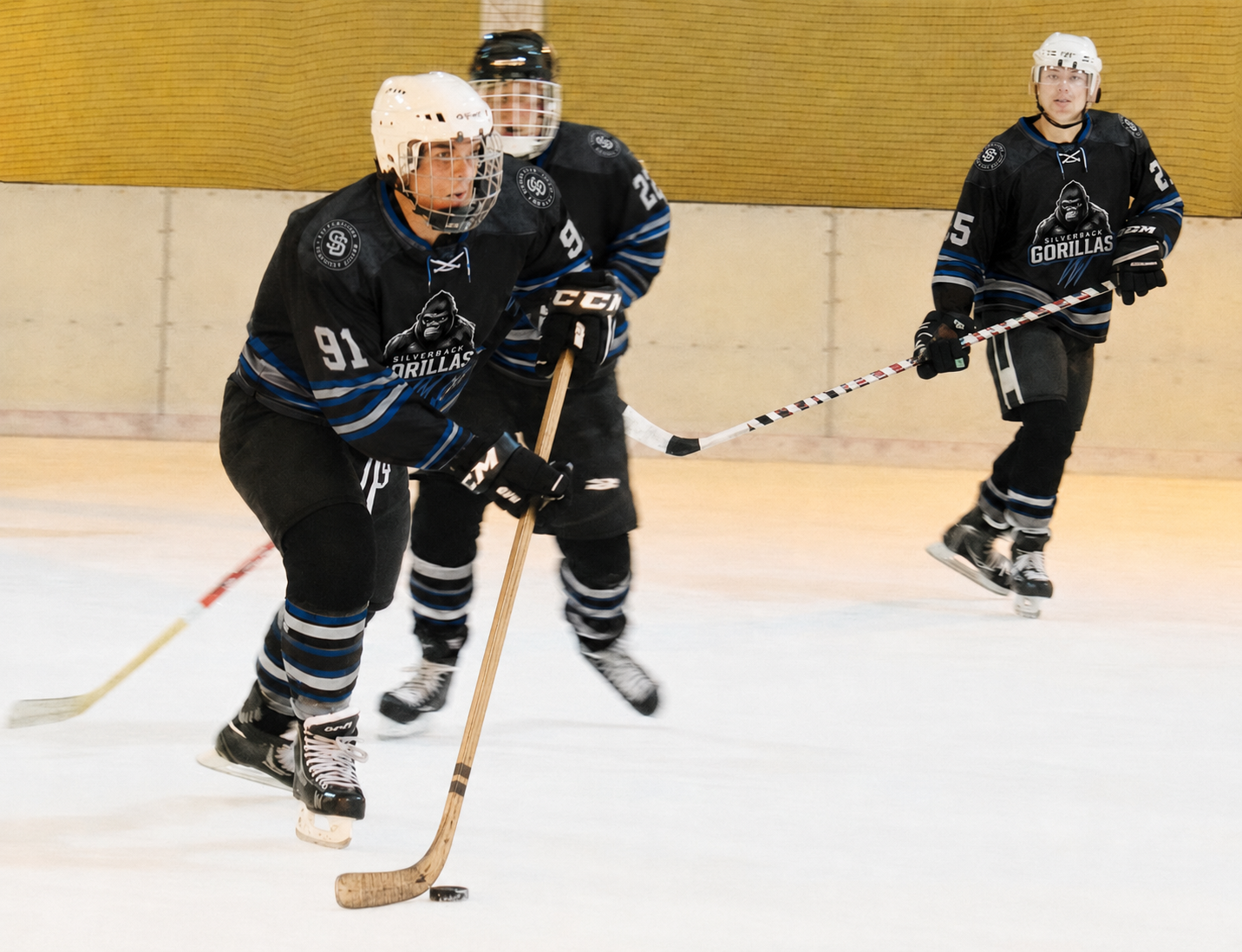 Silverbacks players skating through a structured development drill.